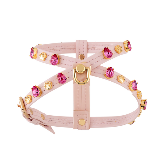 a pink leather dog harness with pink stones